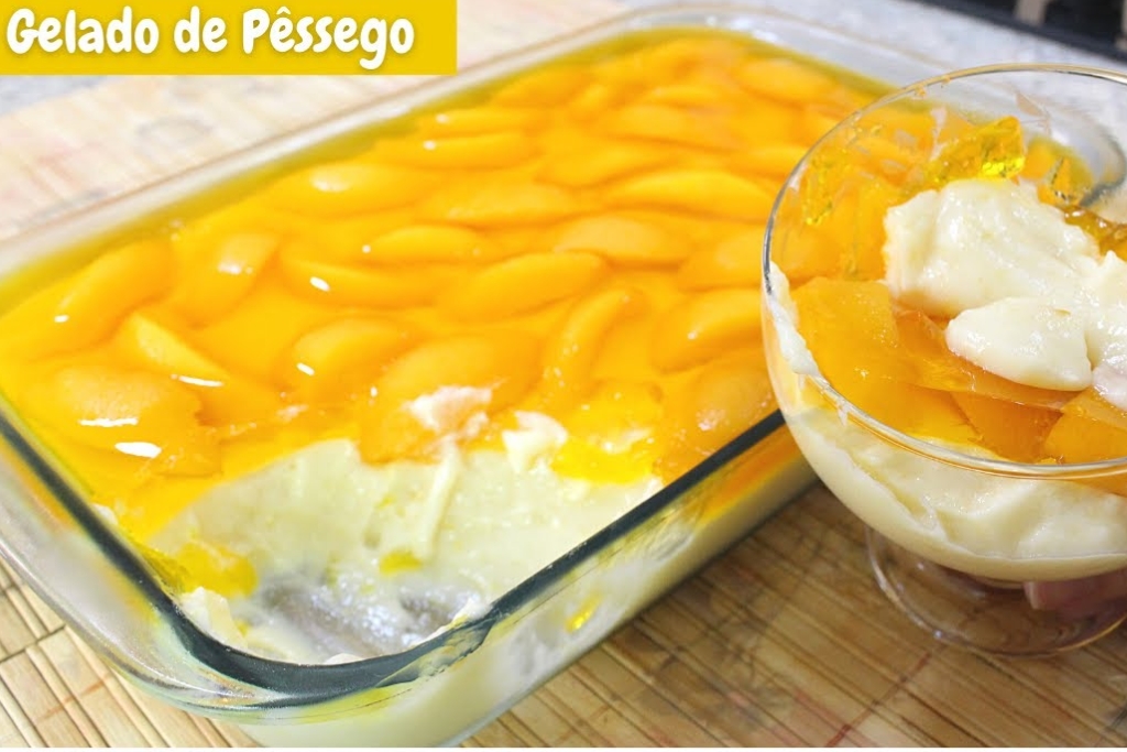 Gelado de pêssego, uma sobremesa simples feita com pêssego em calda e fica pronta em minutos Gelado de pêssego, uma sobremesa simples feita com pêssego em calda e fica pronta em minutos