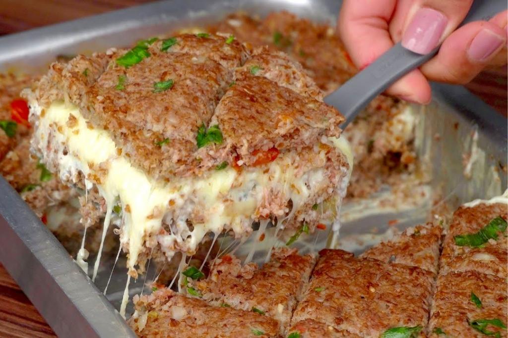 Esse quibe de forno recheado é uma verdadeira tentação! Esse quibe de forno recheado é uma verdadeira tentação!