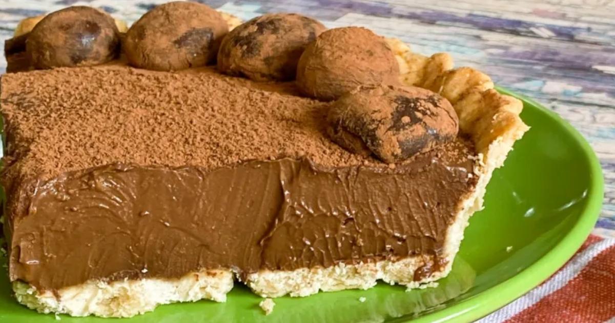 Torta de chocolate amargo, com uma textura extremamente macia que derrete na boca Torta de chocolate amargo, com uma textura extremamente macia que derrete na boca